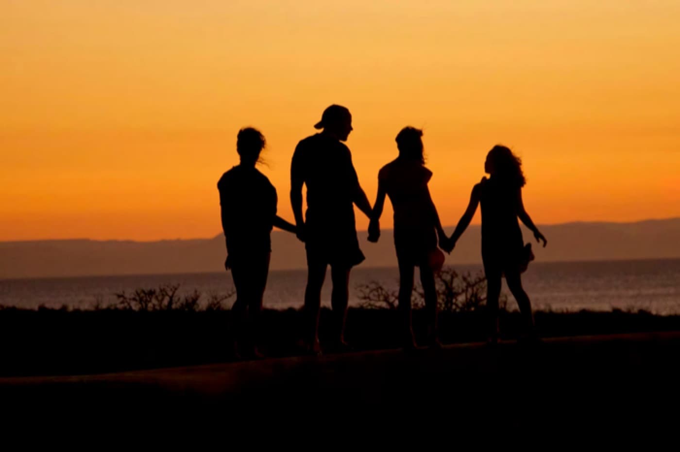 A family sharing a quiet connected moment outdoors